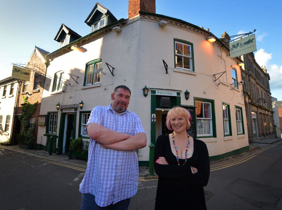 Coach and Horses owner/manager Dean Morris, and bar person Nikki Davies