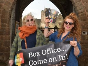 SOUTH PIC MNA PIC  DAVID HAMILTON PIC SHROPSHIRE STAR 29/03/22 Inviting people to buy tickets for the Ludlow Fringe Festival, (left) festival director Anita Bigsby, and (right) community and education co-ordinator Jess Laurie, at Ludlow Castle..
