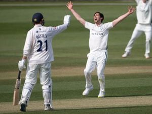 Worcestershire's Ed Barnard celebrates taking the wicket of Essex's Dan Lawrence