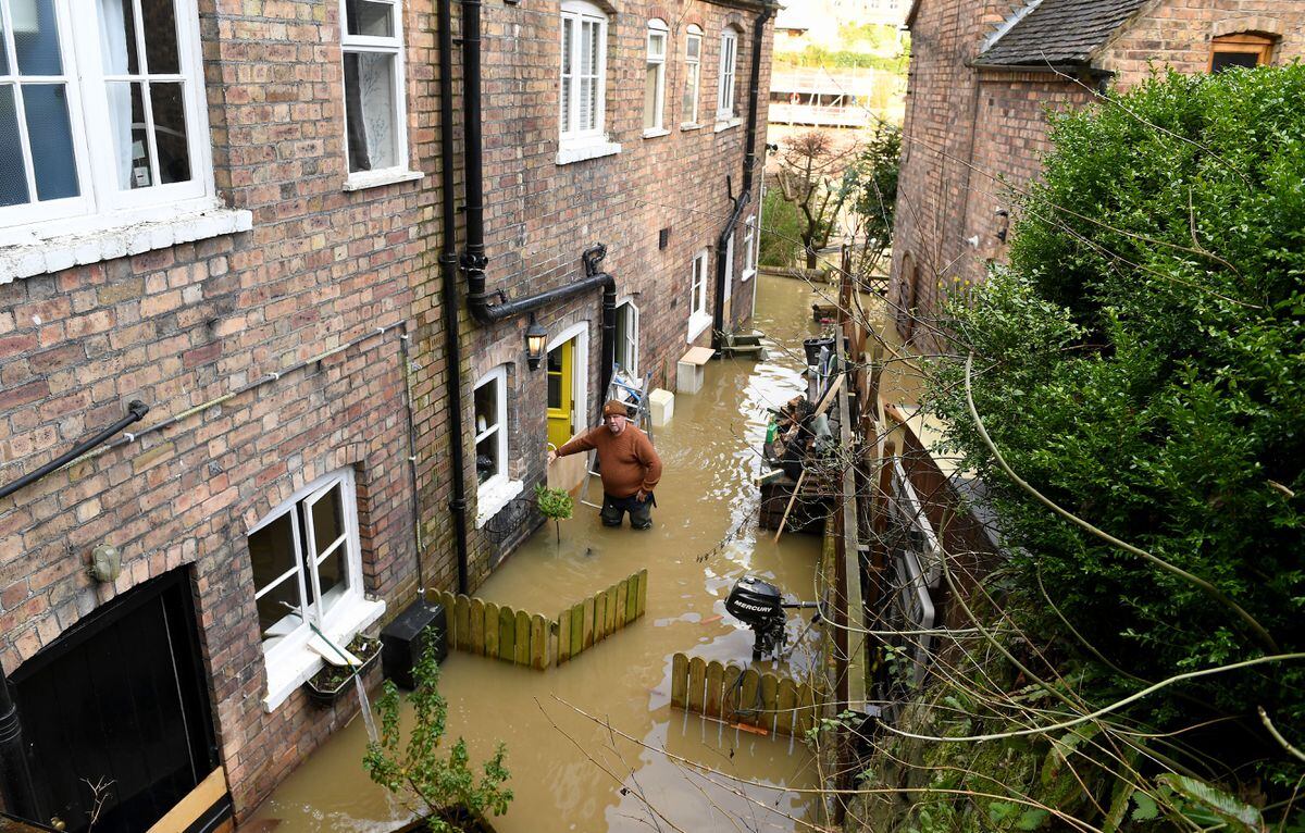Vic Haddock aged 60, who lives next to the River Severn in Ironbridge trying to protect his home – Picture: Sam Bagnall