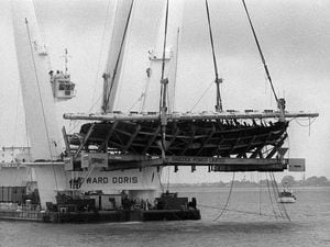 The wreck of Henry VIII's Flagship, The Mary Rose, being raised from the seabed on the Solent off Portsmouth