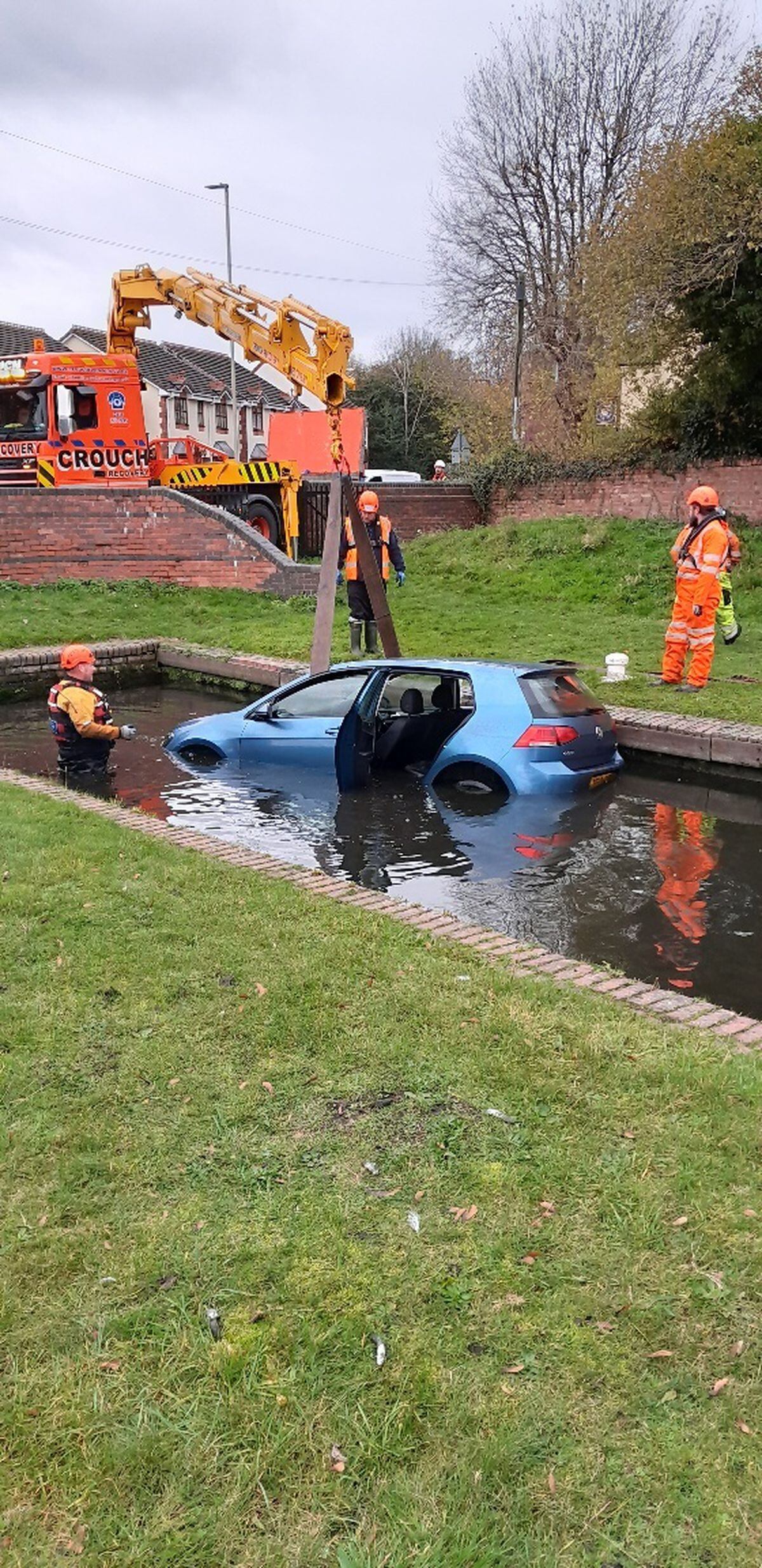 The car being removed from the canal. Photo: Canal & River Trust West Midlands.