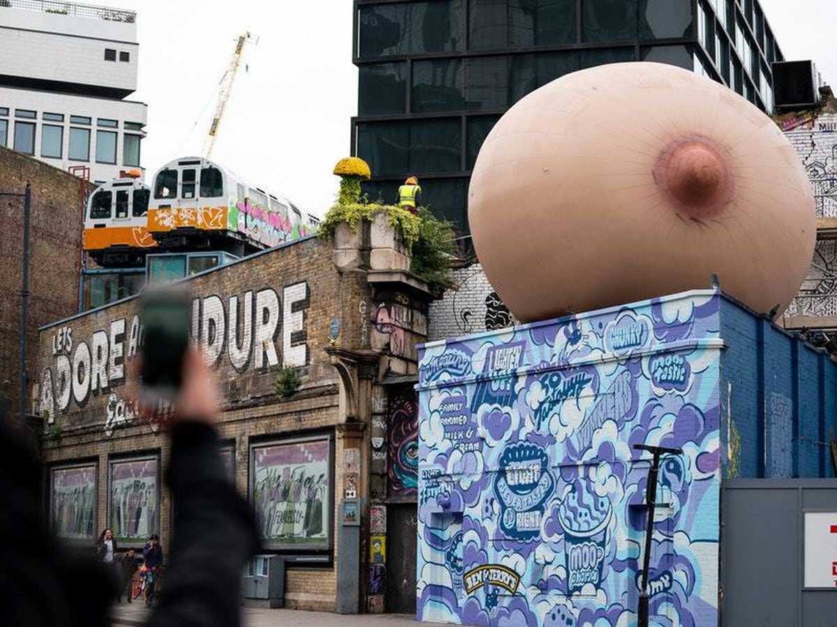 Video: Giant inflatable boobs appear all over London to support  breastfeeding in public