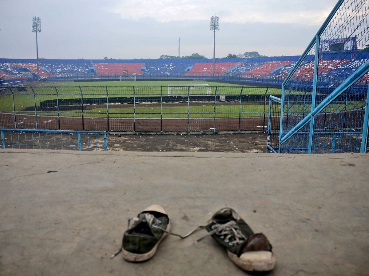 A pair of trainers trampled in the stands at Kanjuruhan Stadium