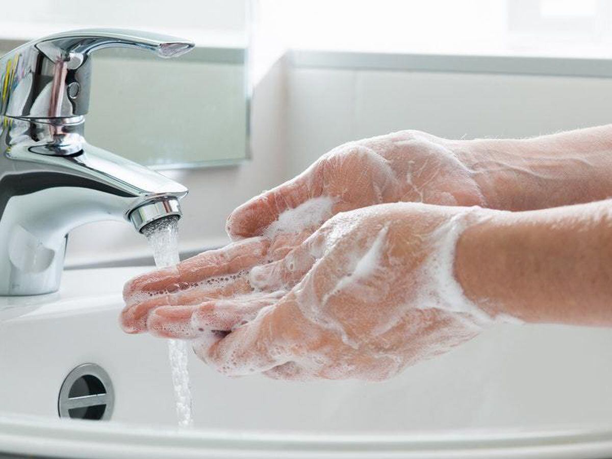 Person washing their hands