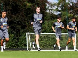 Chem Campbell, Nathan Collins, Joe Hodge and Maximilian Kilman of Wolverhampton Wanderers warm up during a Wolverhampton Wanderers Training Session at The Sir Jack Hayward Training Ground on September 07, 2022 in Wolverhampton, England. (Photo by Jack Thomas - WWFC/Wolves via Getty Images).