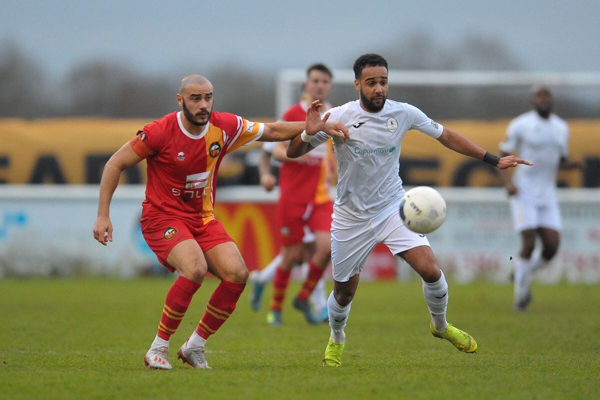 TELFORD COPYRIGHT MIKE SHERIDAN Brendon Daniels of Telford gives chase under pressure from Spencer Hamilton during the Vanarama Conference North fixture between AFC Telford United and Gloucester City at Jubilee Stadium, Evesham on Saturday, December 28, 2019...Picture credit: Mike Sheridan/Ultrapress..MS201920-037.