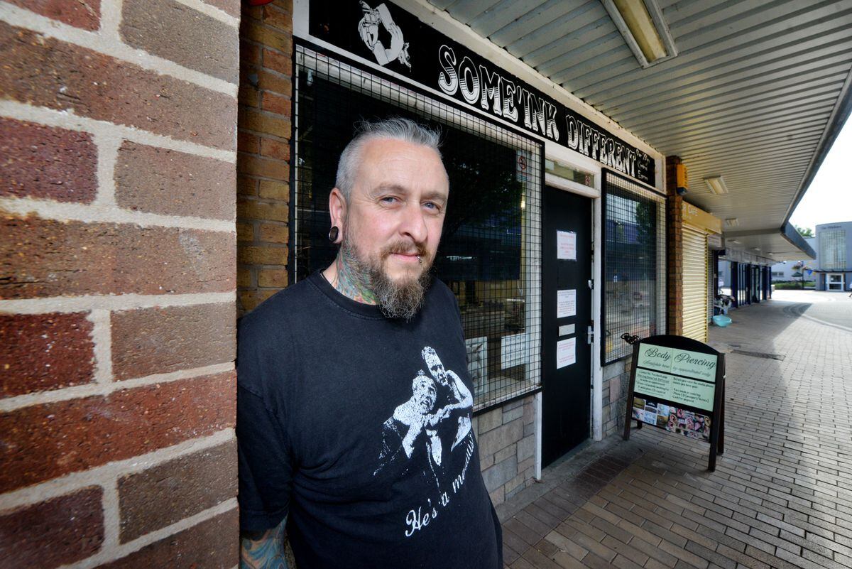 LAST COPYRIGHT SHROPSHIRE STAR STEVE LEATH 08/07/2022..Pic in Oakengates of business on and around the Limes Walk area, where there are proposals to demolish one building and turn other business's upstairs rooms into flats.  Rob Saxon from Some'Ink Different..