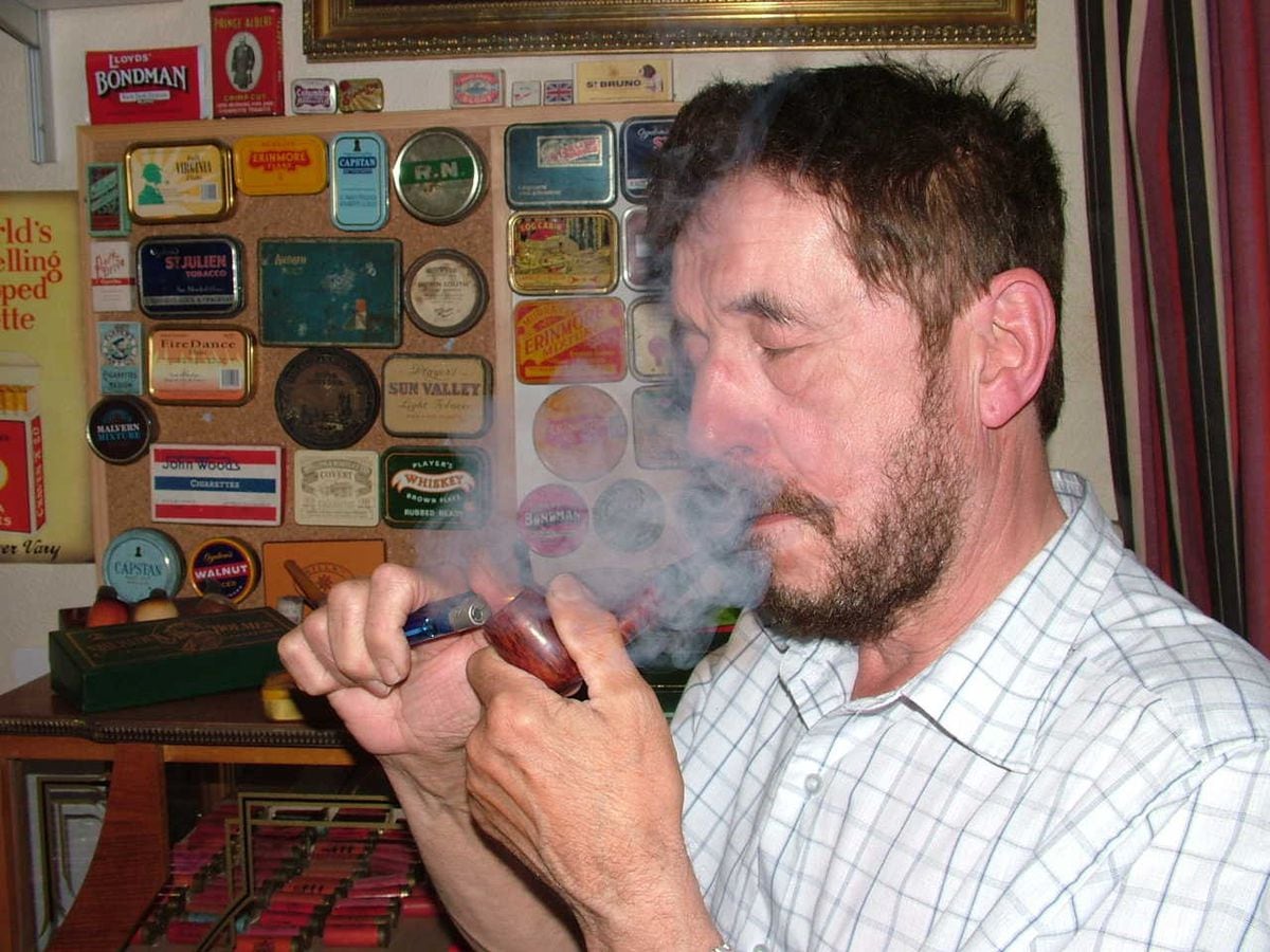 Guy Smith puffing away on one of his favourite pipes.