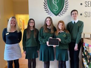 Justine Ellory, left, community relationship manager from Morris Care, with Priory School pupils from left; Poppy Thorpe, Annabelle Roberts, Ellin Harris and Dan Ward