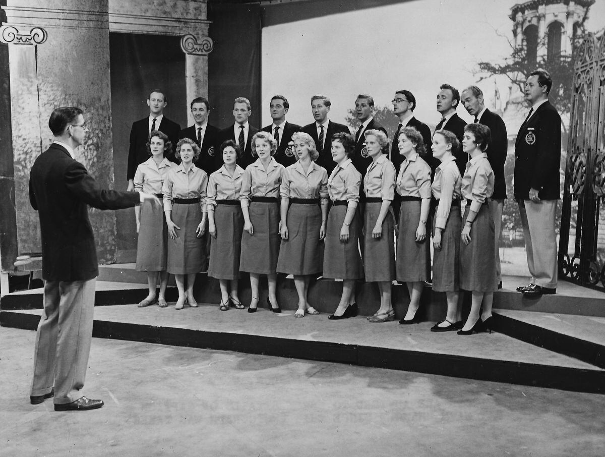George Mitchell with his choir in 1957.