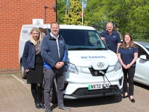 Pave Aways director Charlie Davies, Jamie Evans, Victoria Lawson and Steven Owen with one of the new electric vans  