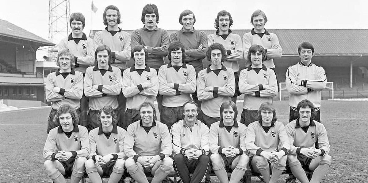 Parkes, back row third from left, in a squad photo from the 1970s