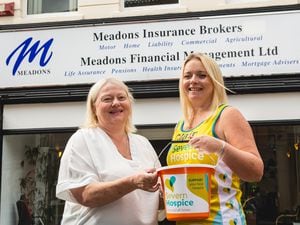Marathon runner Clair Hatton and Lesley Prior, manager at Meadons Insurance Brokers. Photo by Malcolm Hart