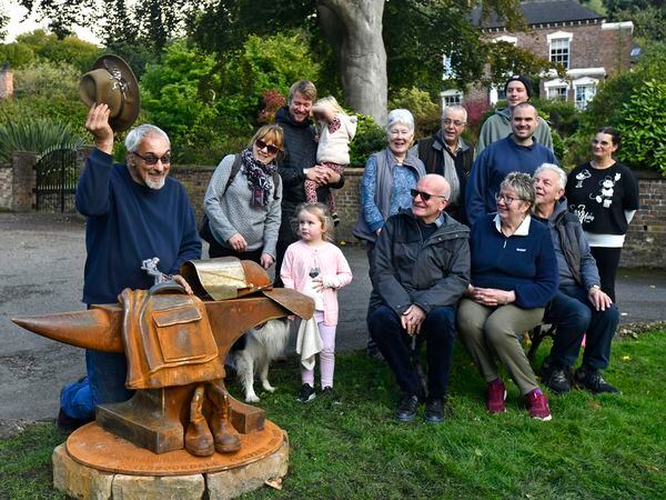 Residents watch sculptor Chris Wright installing the sculpture commemorating Men of Iron that worked at Coalbrookdale Foundry at Coke Hearth. Picture: Dave Bagnall