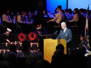 Lieutenant Colonel Terry Boxall reads from the Roll of Honour at the November 2014 Telford & Wrekin Council Festival of Remembrance at Oakengates Theatre. 