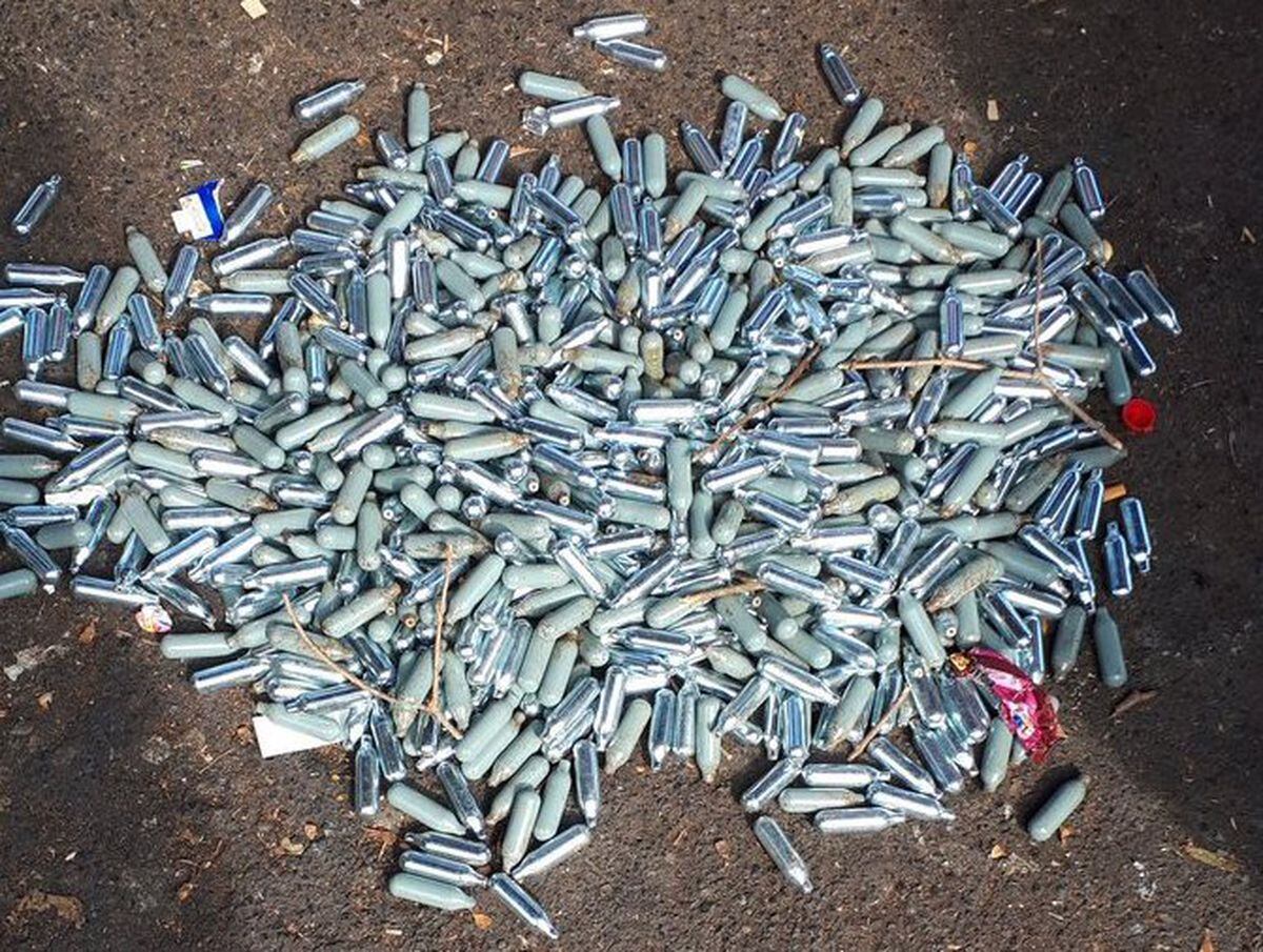 Discarded nitrous oxide canisters