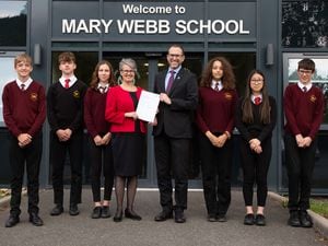 Headteacher Pete Lowe-Werrell with Sarah Godden, CEO of TrustEd CSAT Alliance and pupils from Mary Webb School 