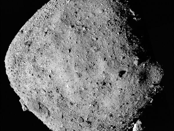 This mosaic image of asteroid Bennu is composed of 12 PolyCam images