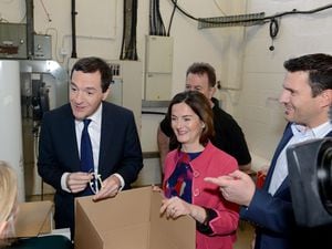 Chancellor George Osborne  launching new Conservative poster during visit to  LVS Small Plastic Parts, Stafford Park, Telford. Chancellor George Osborne with conservative candidate Lucy Allen and MD Simon Anderson Picture David Bagnall.