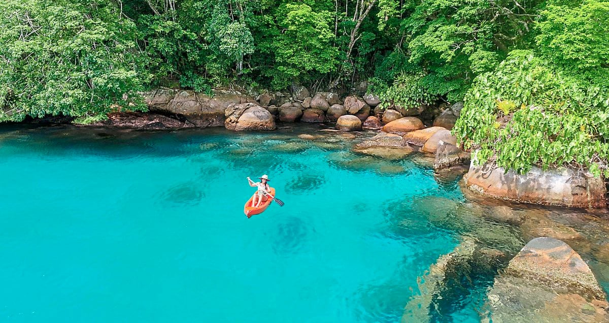 Paddling in the clear waters of Paraty