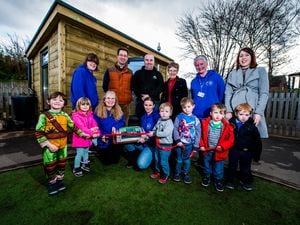A new learning building has opened at Christchurch Pre-School Nursery based at Oakmeadow School in Bayston Hill. Pictured are pre-school staff and children, Rev Peter Hubbard and Paul Kynaston from Little Village Group
