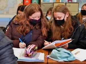 It's hoped the masks in classrooms may be ditched soon as the number of cases finally starts to fall again