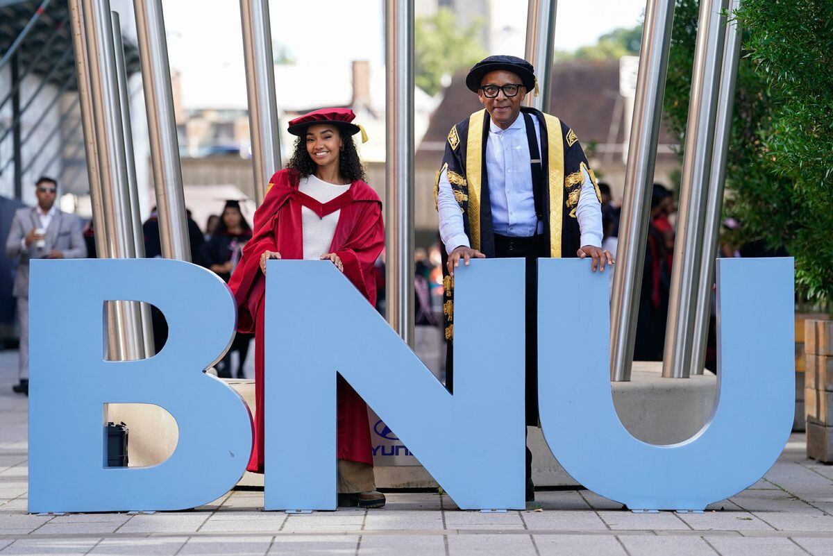 Leigh-Anne Pinnock (left) poses for a photograph with Chancellor of Buckinghamshire New University Jay Blades ahead of receiving her honorary doctorate from the university in High Wycombe. The Little Mix singer is being given the honorary doctorate in recognition of her music career and active campaigning for racial equality. Photo: Andrew Matthews/PA Wire