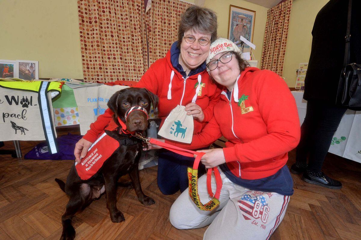 Crafters Lucy and Trudy Gardner with assistance dog Rosie