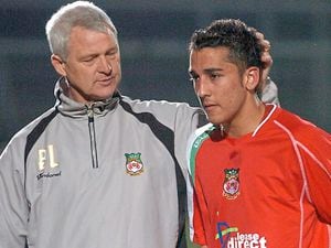 Neil Taylor, who started his senior career at Wrexham, with former Racecourse boss Brian Little