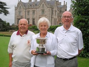 Proud Borrett Cup winners, from left: Geoff Ward, Sheila Payne and Colin Meadows with the new trophy