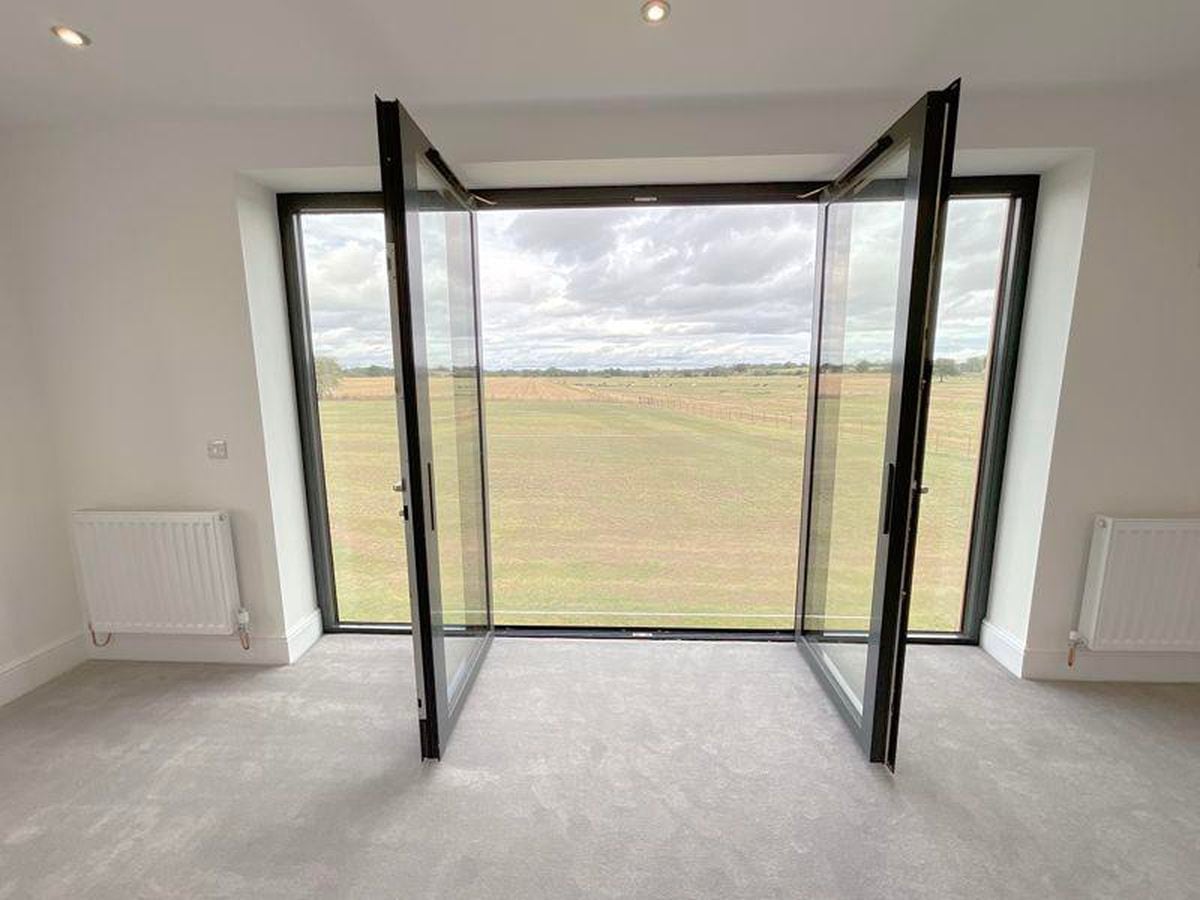 Large doors and windows offer panoramic views onto the Shropshire countryside. Photo: James Du Pavey
