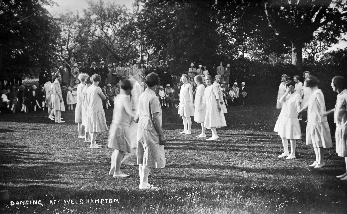 This is dancing at Welshampton – and we know that because it says so on the front of this postcard. Unfortunately there is no other information, although it looks to be from the 1920s.Picture courtesy of Ray Farlow.
