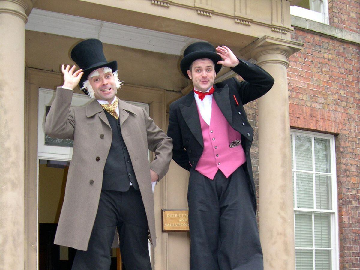 Richard Jones and Mark Russell, aka Phillipe and Riccardo, at Darwin's birthplace on The Mount during the 2004 festival.