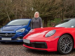 Joanne McGuigan with the Porsche 911 and her Vauxhall Corsa