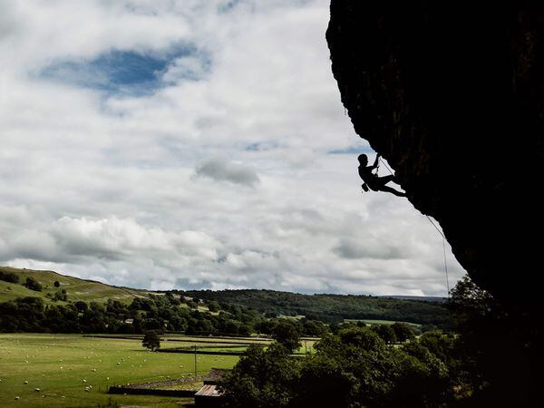 A rock climber on Kilnsey Crag