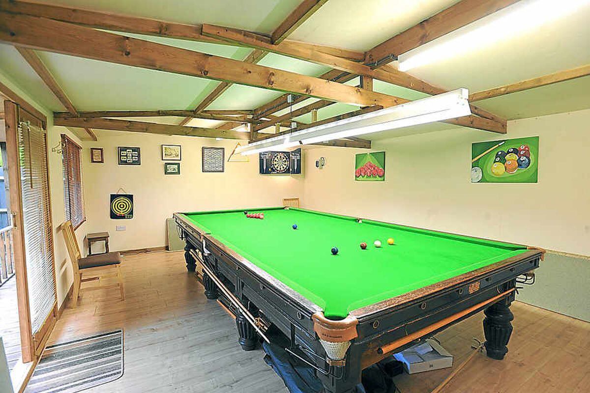 Man paradise - Dave's dream shed, complete with snooker, darts and beer. . .