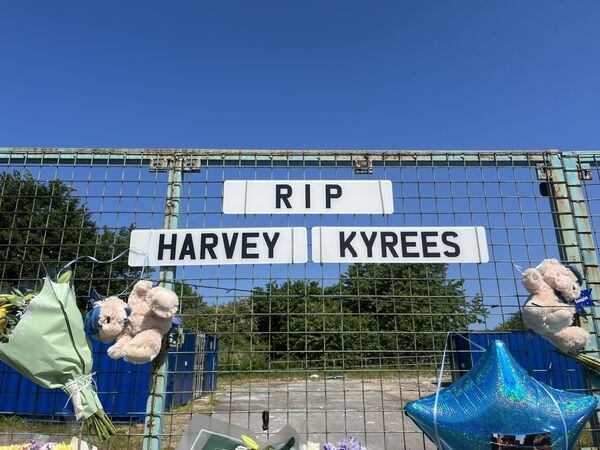Floral tributes left to Kyrees Sullivan and Harvey Evans on Snowden Road, Ely, Cardiff following their deaths in a road accident