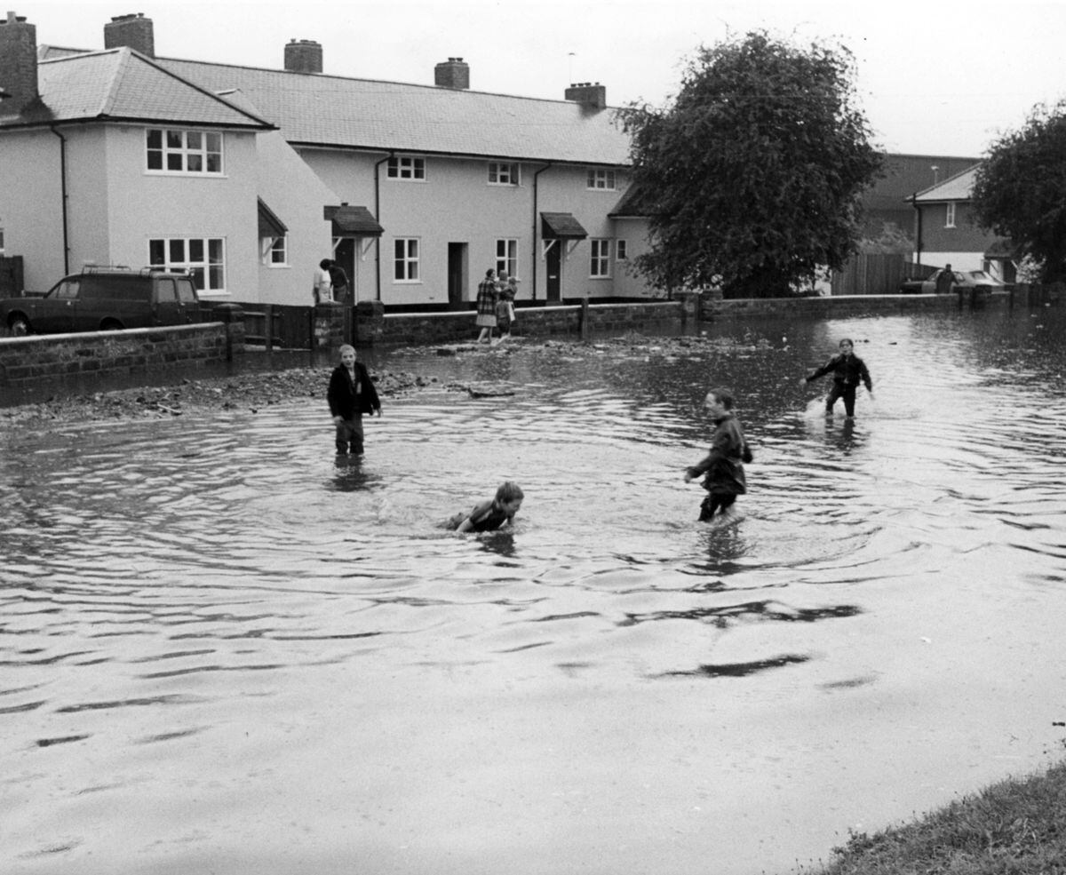Come on in, the water's lovely (not recommended, by the way). Youngsters play in the floods in Guy Avenue, Wolverhampton, after a thunderstorm on August 14, 1984.