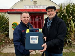Community First Responder Ben Steventon and theatre caretaker Ian Clark with the new emergency defibrillator