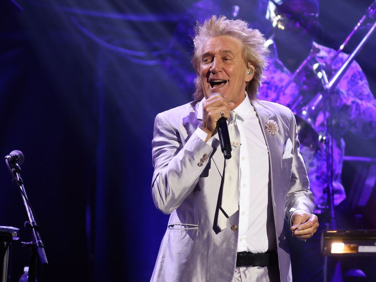 Rod Stewart performs at the Raise the Roof fundraiser
