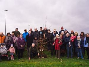 Guests at the community tree planting event in Guilsfield