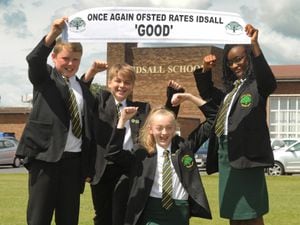   Celebrating a 'good' rating, pupils (left-right) Tyler, 12, Cayden, 12, Brooke, 12, and Bertha, 11, at Idsall School, Shifnal..