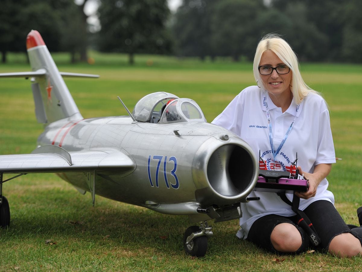 Nikki Bishop with a MIG 17 at the Weston Park Airshow International