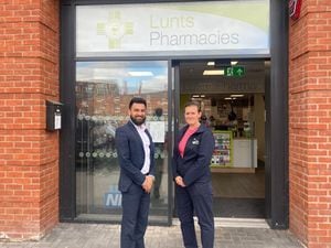 Azim Ashraf, Pharmacy Manager and Helen Grass, Pharmacist outside Lunts Pharmacy, The Tannery, Shrewsbury.