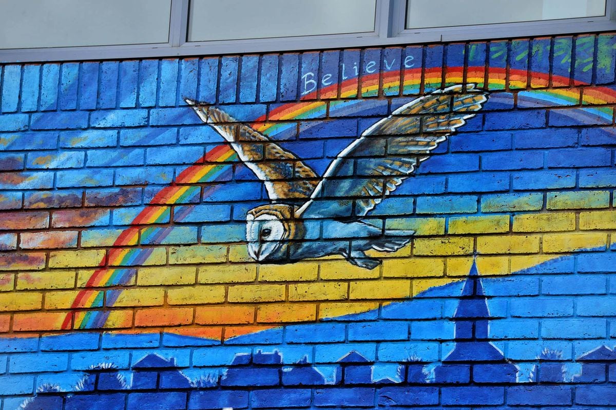 Artist Rory McCann's mural at Brown Clee Primary School