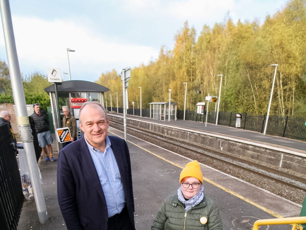 Liberal Democrat leader Sir Ed Davey with wheelchair user Becca Proctor at Whitchurch Railway Station, where 44 steps must be navigated to reach Platform 1.