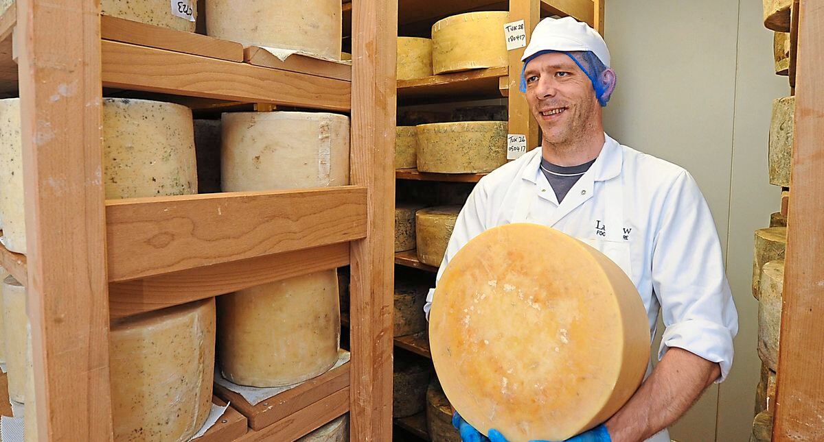Dairy manager Dudley Martin, in the cheese maturing room