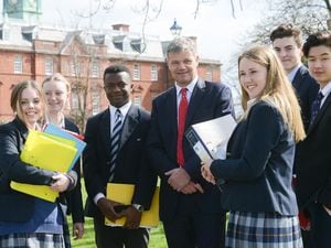 Headmaster Mark Turner with pupils from Shrewsbury School