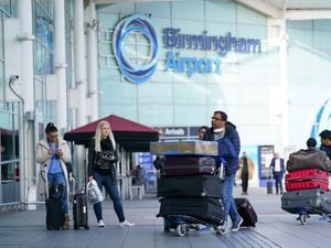 Passengers arriving at Birmingham Airport
